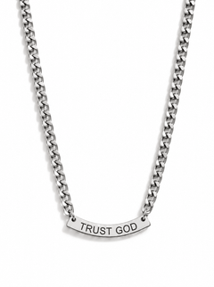 A silver-toned chain necklace with a curved bar pendant with the words 'TRUST GOD' laser cut in capital letters, shown against a plain white background.